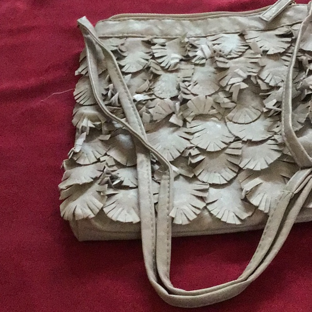 Purse 👜   Vinyl with fringes.